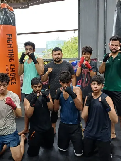 The morning crew posing after a tough session. Starting the day with the grind builds a special kind of bond.