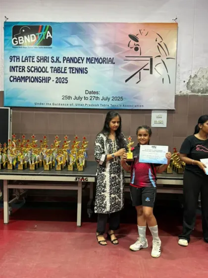 One of our talented young players receiving her award at the GBN Interschool Championship.