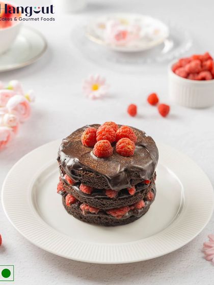 Our Raspberry with Belgian Chocolate Bento cake is elegant, rich, and berry perfect for dessert connoisseurs. The tartness of the raspberry cuts through the rich chocolate beautifully.