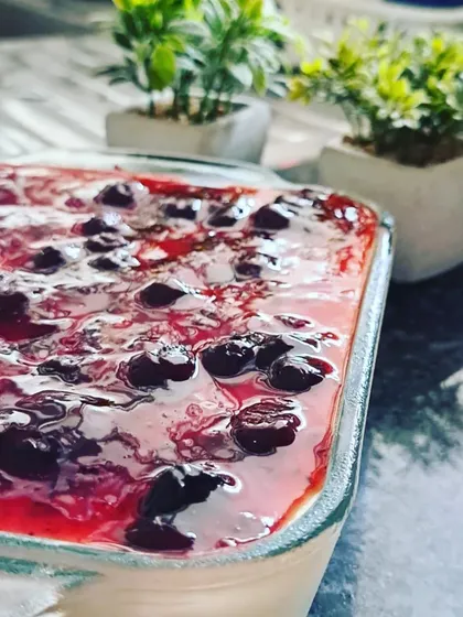 This is my signature Baked Blueberry Yoghurt, a dessert that is both gorgeous and delightful. The creamy baked yoghurt is topped with a vibrant, sweet blueberry compote for the perfect finish to any meal.