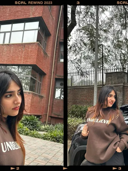 A thoughtful pose in the brown sweatshirt. This shows that even the most casual outfits can be styled in a cool, editorial way.