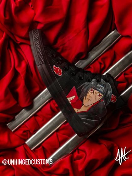 A close-up of Itachi's portrait on the Converse. Capturing his somber expression was essential for this piece, showcasing one of the most complex characters in Naruto.