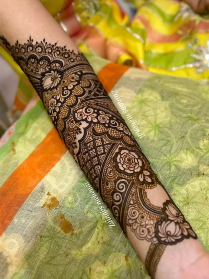 Another close-up of Zeba's arm, highlighting the intricate details and clean lines.