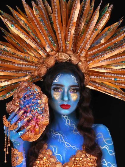 Amazing student work from our creative makeup course. This underwater-themed fantasy look uses body paint, prosthetics, and an elaborate headpiece to create a mythical creature.