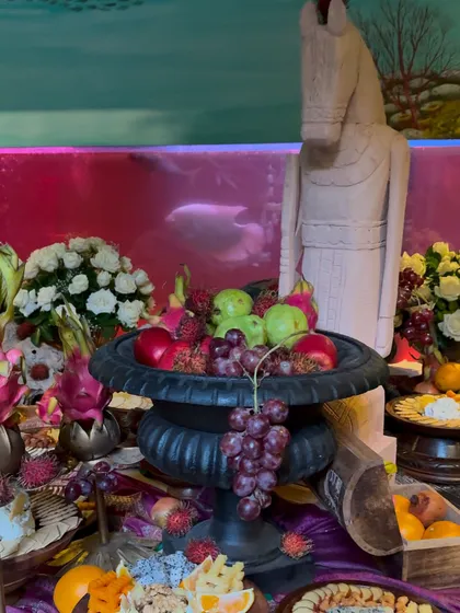 A lavish fruit display for a Rajasthani themed event. The colorful array of fresh fruits is presented in ornate bowls and urns, adding to the feeling of opulence and hospitality.