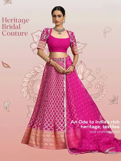 Our Heritage Bridal Couture is an ode to India's rich textiles and craftsmanship. This fuchsia Bandhani lehenga is a prime example, designed for the bride who cherishes her roots.