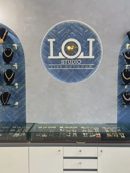 A glimpse into our Mangalore studio, where each jewellery collection is displayed for you to explore. We've designed the space to be welcoming, with our signature blue tile wall showcasing a variety of our handcrafted necklaces and sets.