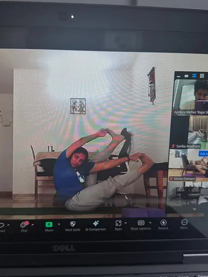 A male practitioner working on his hip flexibility in our online class. My classes are open to everyone who is keen to go deeper into their practice.