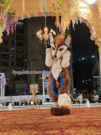 This fox mascot provides a unique and playful character option for themed events. The high-quality costume ensures great photos and a memorable interaction for all your guests.