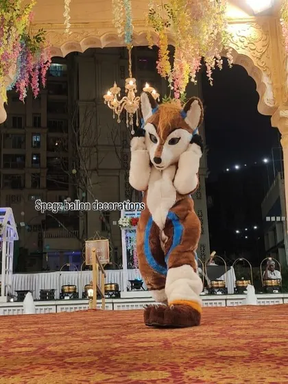 This fox mascot provides a unique and playful character option for themed events. The high-quality costume ensures great photos and a memorable interaction for all your guests.