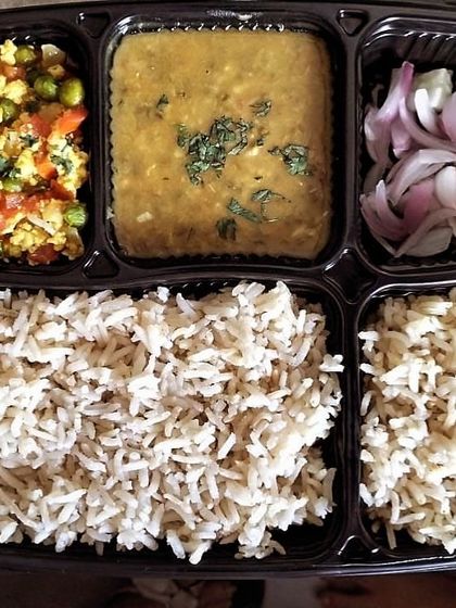 A customized meal with extra brown rice, paneer bhurji, and dal. I can adjust the portion sizes of different components based on your needs.