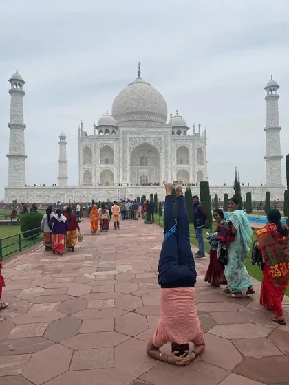Taking my practice everywhere I go. Doing a headstand in front of the Taj Mahal reminds me that yoga isn't just on the mat, it's a way of seeing the world from a new perspective.