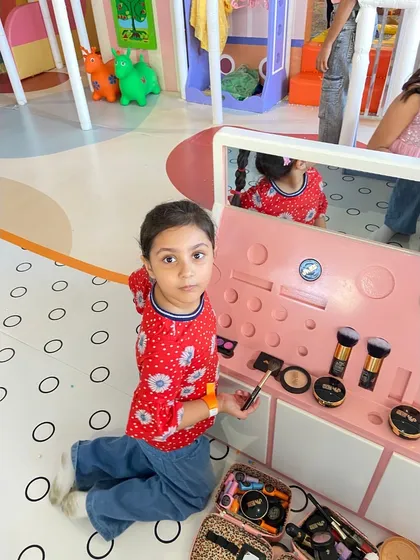 A future makeup artist at work. Our pretend vanity is fully stocked with toy brushes, compacts, and more.