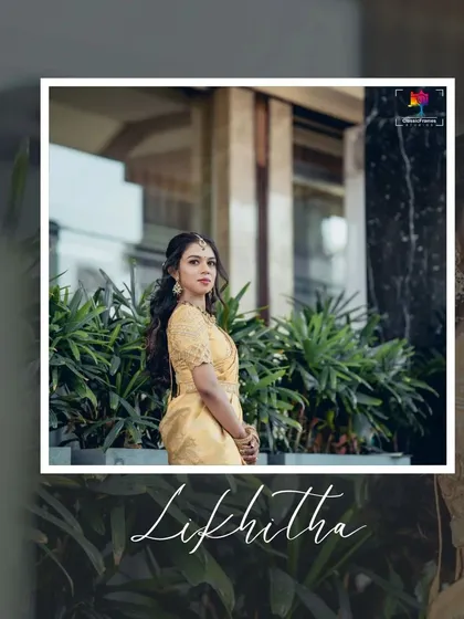 A stylish portrait of Likhitha. The modern architectural background complements her elegant golden saree, creating a chic and contemporary look.