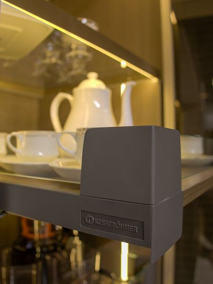 This detail shot shows the high-quality Kesseböhmer hardware used in my designs. These premium fittings ensure that every drawer and cabinet operates smoothly for years to come.