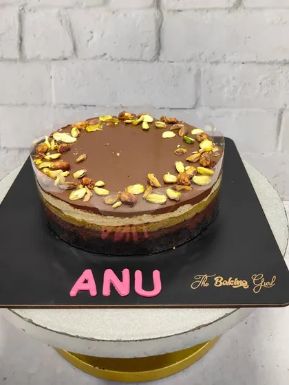 Our Pistachio Chocolate layered cake. It has a wonderful texture and a nutty, rich flavor that our clients love.