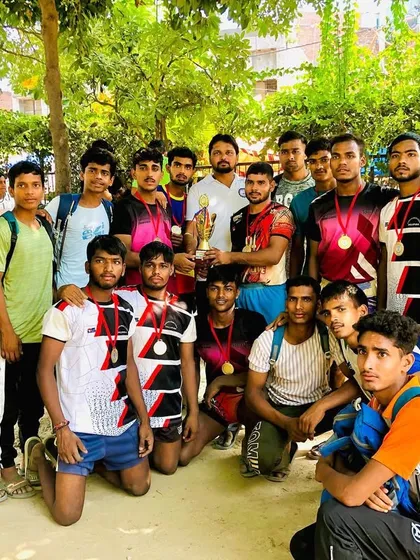 The team celebrating their win at a local tournament.
