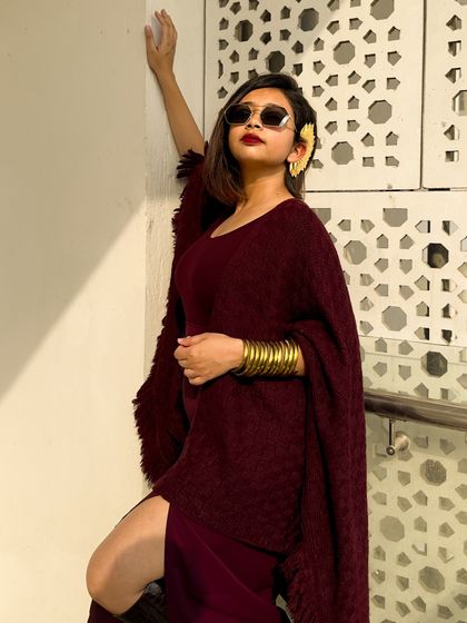 A close-up with sunglasses, adding a cool and mysterious vibe to the look.