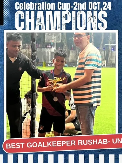 Rushab proudly accepts the Best Goalkeeper award for the Under-10 category. We provide specialized goalkeeper training to ensure every position on the field is strong.