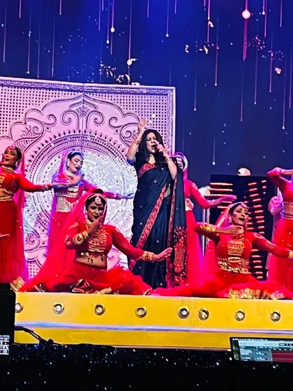On stage is my happy space. Here I am, performing for the Stagecraft Awards, surrounded by the vibrant energy of dancers and a grand production.