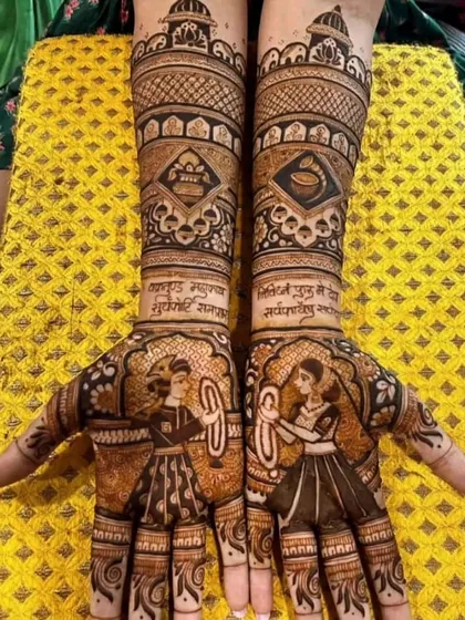 This design is for a bride who loves classic stories, featuring figures of a king and queen. The arms include Sanskrit verses and other royal motifs, creating a truly majestic look.