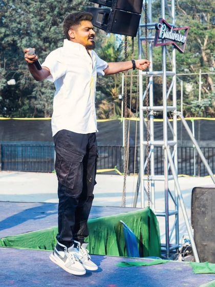Jumping with the energy of the crowd at the Holi 2025 festival. I don't just play music; I become part of the celebration.