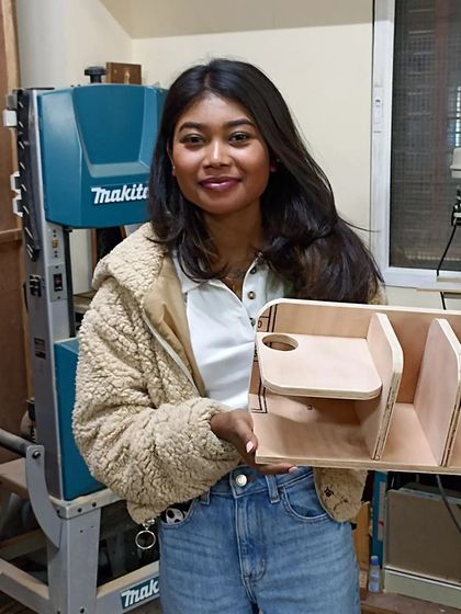 This student designed a multi-functional desk organizer with space for a cup, books, and stationery. It's a perfect example of practical, user-centered design.