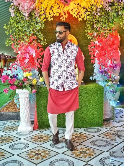 My festive look for a Diwali celebration, wearing a traditional kurta with a floral jacket. I always dress to match the occasion.