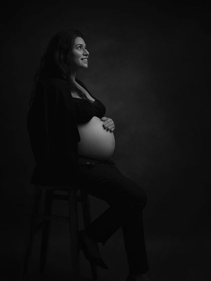 The same portrait in black and white. The monochrome edit adds a timeless and classic feel, highlighting the emotion and form.