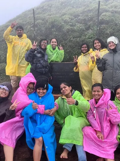Posing for a group photo at a viewpoint in Chikmagalur, with everyone in high spirits.