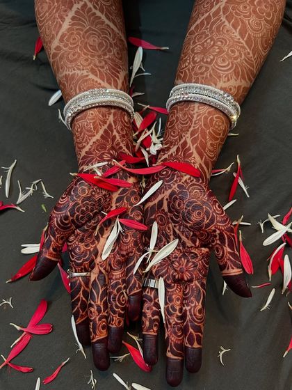 The deep red-brown stain looks so vibrant against the flower petals. This is the beautiful, natural color you get from my pure, chemical-free henna paste.