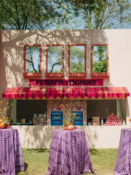 A custom "Frozen Yoghurt" stand at a whimsical Udaipur Mehendi. Fun food stations are a great way to surprise and delight guests.