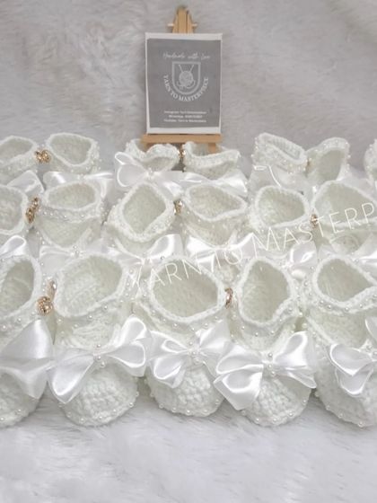 I love preparing large orders for special events. Here is a collection of my white satin-bow booties, ready to be gifted or worn by many little ones.