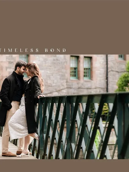 A romantic portrait on a bridge in Dean Village, Edinburgh. The couple shares a close moment, embodying a timeless bond in a picturesque, historic setting.