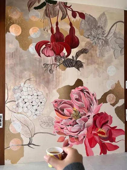 The 'Native Grace' mural, a celebration of love and life expressed through flowers. This piece combines vibrant fuchsias and soft peonies with gold leaf accents, creating a rich tapestry of color and emotion.
