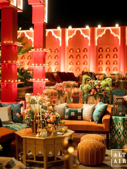 A lounge area at 'Midnight Marrakesh', where we used an unconventional color palette of tangerine and blues. The design was a fusion of Moroccan and Indian courtyards, creating a refuge of color and pattern.