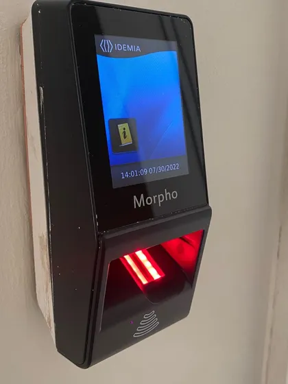 This image shows a recent installation of a Morpho biometric access control system. These advanced fingerprint scanners provide keyless, high-security entry for homes and offices, ensuring only authorized individuals can gain access.