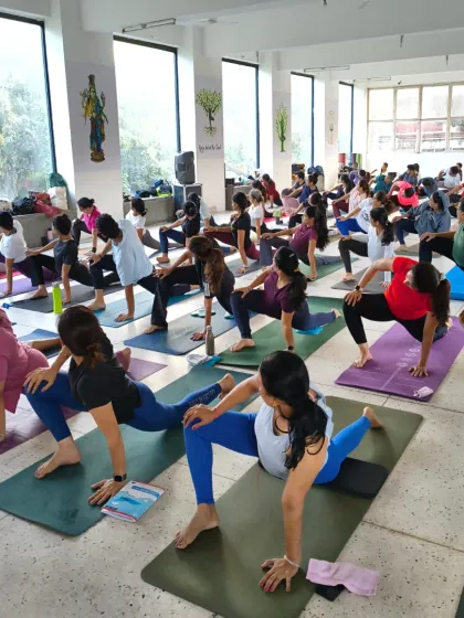 A dynamic moment from our Rishikesh retreat, with the tribe flowing through a low lunge variation. We welcome all levels, focusing on mindful movement and listening to your own body.