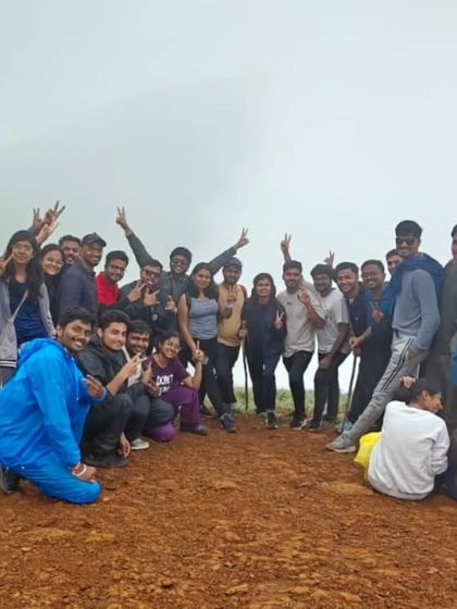 Posing for a victory shot on the trail. The camaraderie built while navigating the path is a huge part of what makes our treks special.