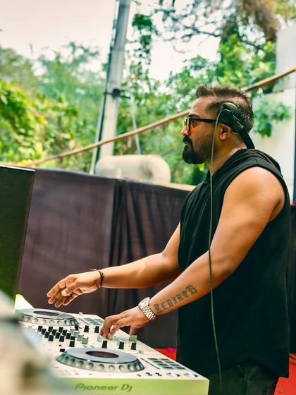 Focused on the mix during a daytime festival set. Even under the sun, I keep the energy high with a seamless flow of tracks.