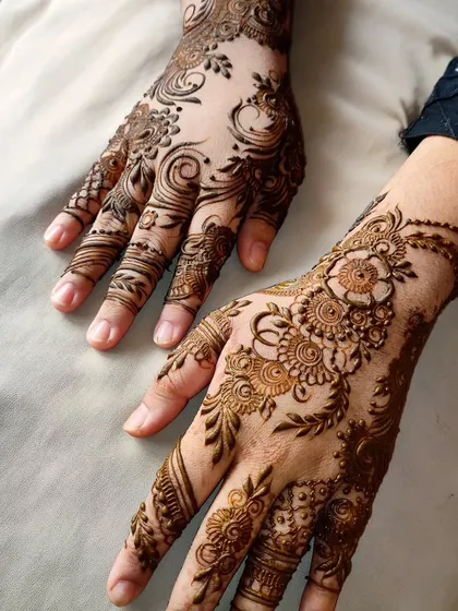A beautiful fusion of floral and swirling Arabic-style elements, creating a sense of movement.