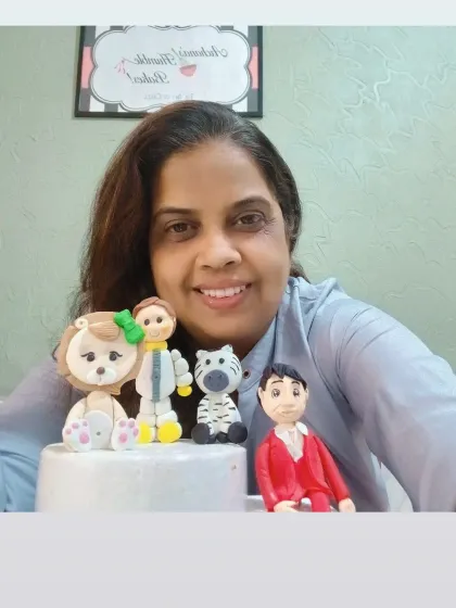 Take your cake decorating skills to the next level by learning to make your own fondant figures. Here I am with some cute, handcrafted toppers from my fondant art workshop.