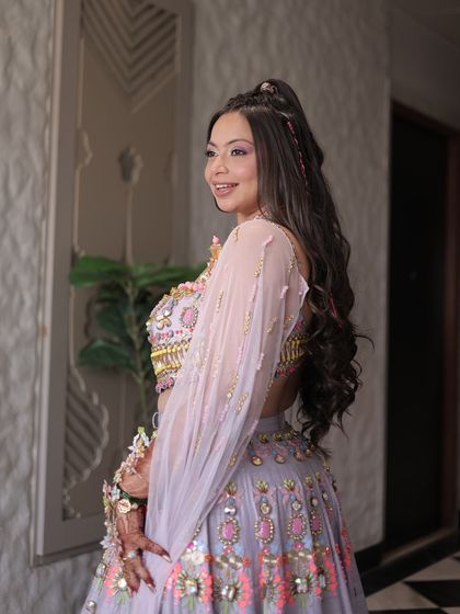 A side view of the fun carnival hairstyle.