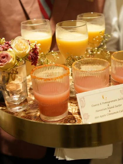 A tray of assorted welcome drinks, including Guava & Pomegranate Juice and Hawaiian Island Surfer. We offer a variety of flavours to cater to every guest's preference.