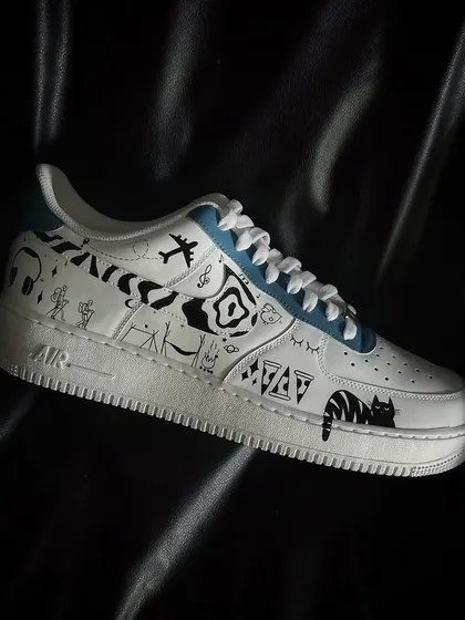 A side profile of the doodle custom sneaker.