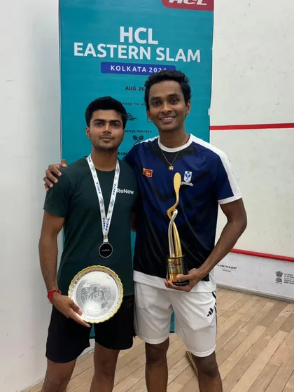 My player with his opponent after the final match, showcasing sportsmanship alongside competitive success at the HCL Eastern Slam.