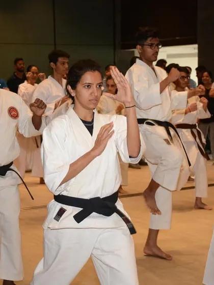A group of our black belt students during a training session at the newly inaugurated P.J. Hindu Gymkhana dojo. The focus and intensity are palpable as they practice their forms.