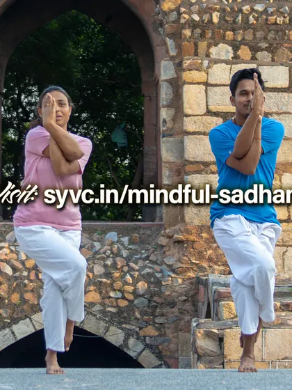 Our online "Mindful Sadhana" course is for yoga teachers and intermediate students looking to deepen their practice. Here, practitioners hold Garudasana (Eagle Pose), which improves balance and concentration.