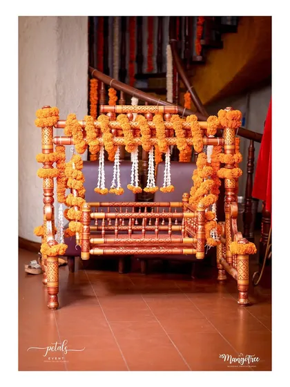 A naming ceremony is a precious beginning. I decorated this traditional wooden jhula, or cradle, with garlands of auspicious marigolds and delicate jasmine flowers, creating a beautiful and sacred centerpiece for welcoming a new life.