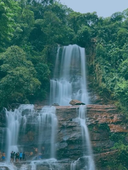 A stunning view of a waterfall in Chikmagalur, identical to image 44, showcasing the impressive scale of the natural wonder.